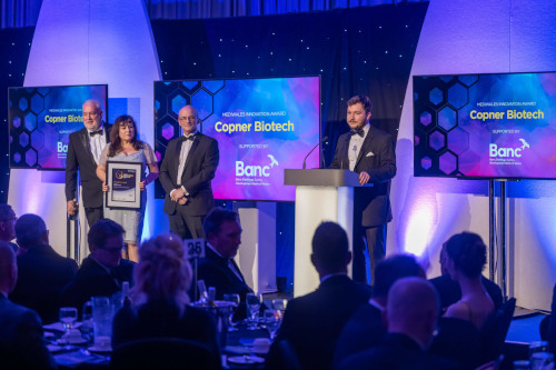 CEO CTO & CFO receiving MediWales Innovation Award